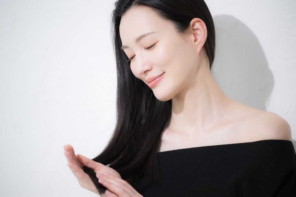 a woman with permanent hair straightening