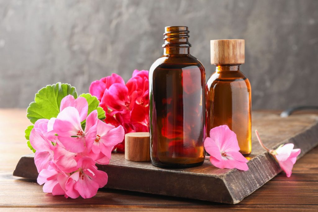 a bottle of geranium essential oil