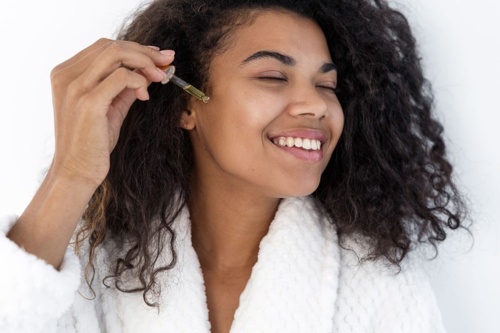 a woman trying the best oil for face wrinkles