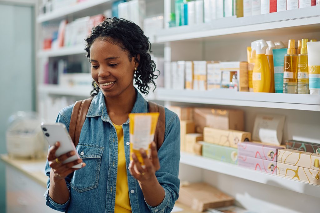 young woman looking at skincare using self care apps for women